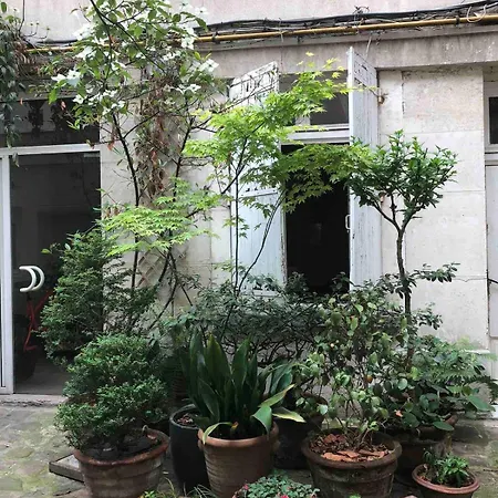 Light Filled Architects Nest Between Rooftops Paris
