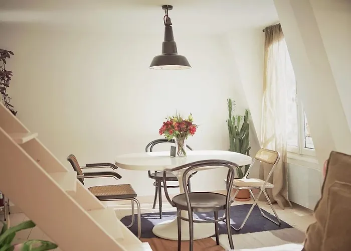 Light Filled Architects Nest Between Rooftops